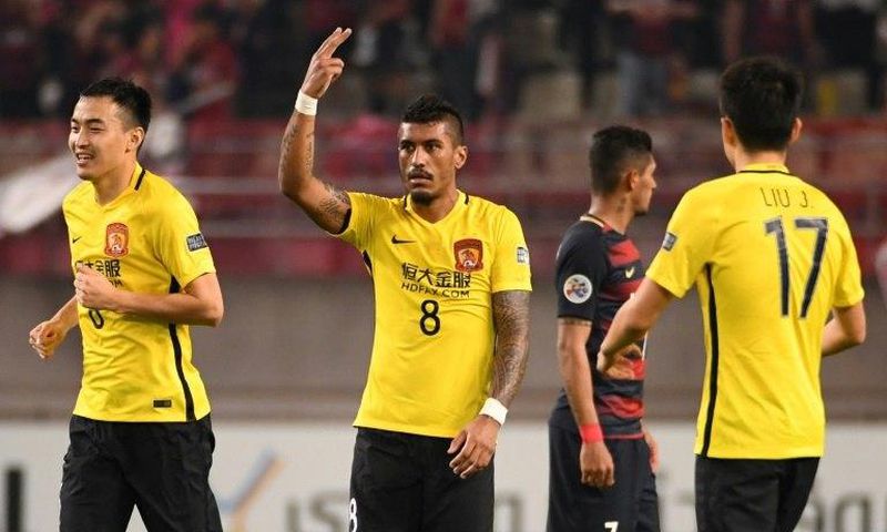 Guangzhou Evergrande's Paulinho (C) celebrates scoring a goal during an AFC Champions League match in Kashima, Japan, in May 2017
