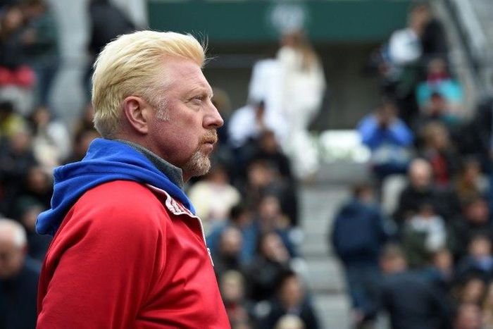 This photo taken on June 3, 2016 shows German former tennis player Boris Becker attending the men's semi-final match between Austria's Dominic Thiem and Serbia's Novak Djokovic at the Roland Garros 2016 French Tennis Open in Paris