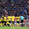 The away supporters were soon celebrating as Malaysia drew level before the half-hour