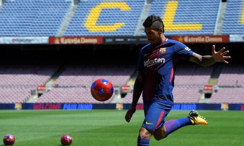 Barcelona's new signing Paulinho Bezerra kicks a ball during his official presentation, at the Camp Nou stadium in Barcelona, on August 17, 2017
