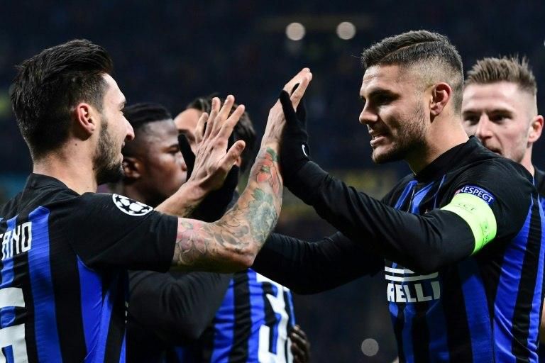 "One player doesn't make a team:" Mauro Icardi (R) rescued a 1-1 draw but Inter Milan crashed out of the Champions League.
