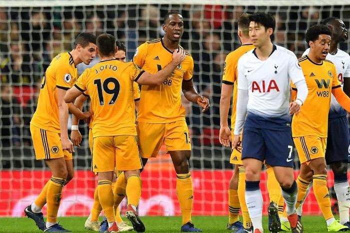 Boly blow: Tottenham's title charge crashed to a halt after Willy Boly (centre) levelled for Wolves at Wembley