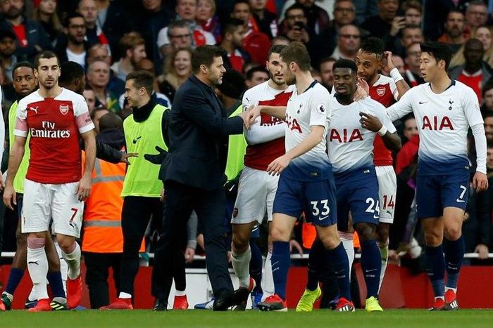 Mauricio Pochettino tried to keep the peace as players clashed after Tottenham's equaliser at Arsenal