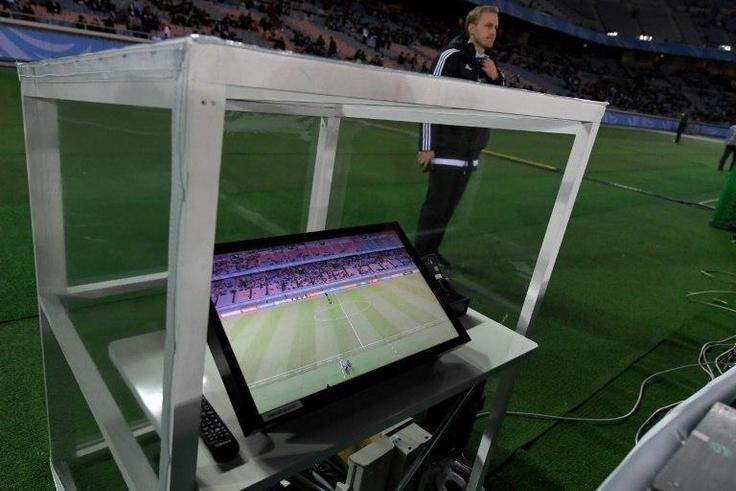 The video assistant referee system is placed beside the pitch prior to the Club World Cup semi-final football match between Mexico's Club America and Spain's Real Madrid at Yokohama International stadium in Yokohama on December 15, 2016