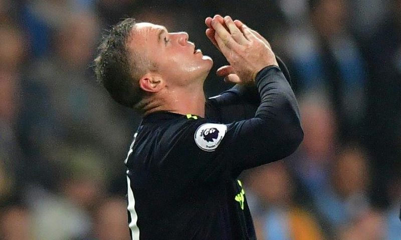 Everton's striker Wayne Rooney celebrates scoring on August 21, 2017