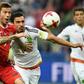 Russia forward Fedor Smolov (L) vies for the ball against Mexico defender Diego Reyes during the 2017 Confederations Cup group A match in Kazan on June 24, 2017