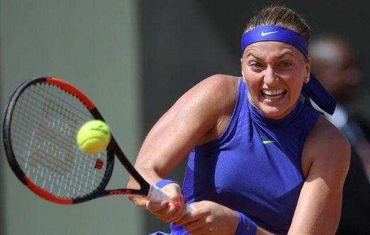 Two-time Wimbledon champion Petra Kvitova made a triumphant comeback from knife injuries by lifting the Birmingham title Sunday