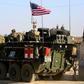 US forces with armored vehicles have been supporting the fight against IS in Syria