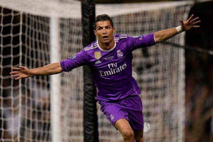 Real Madrid's striker Cristiano Ronaldo celebrates after scoring their third goal on June 3, 2017