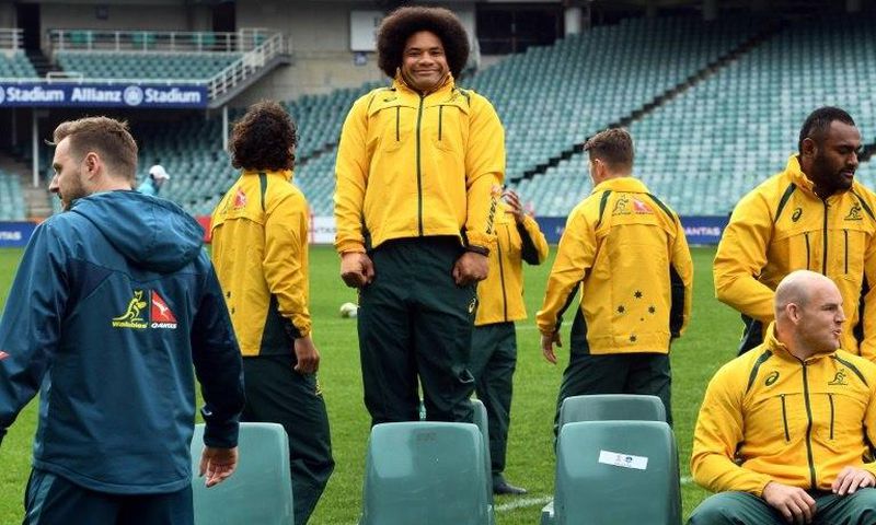 Australian rugby players gather for a team photo in Sydney, on 16 June 2017