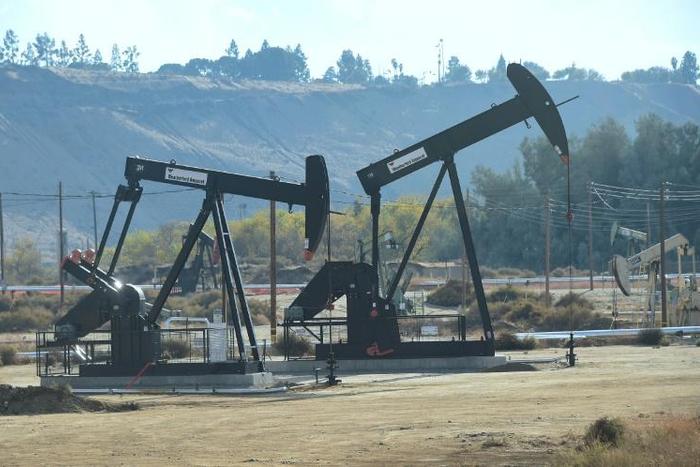 A dimmer global growth outlook and a glut of oil have sent crude prices sliding lower