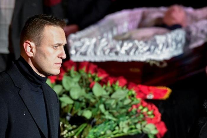 Russian opposition leader Alexei Navalny pays his last respects to human rights icon Lyudmila Alexeyeva, a Soviet-era dissident who died at the age of 91