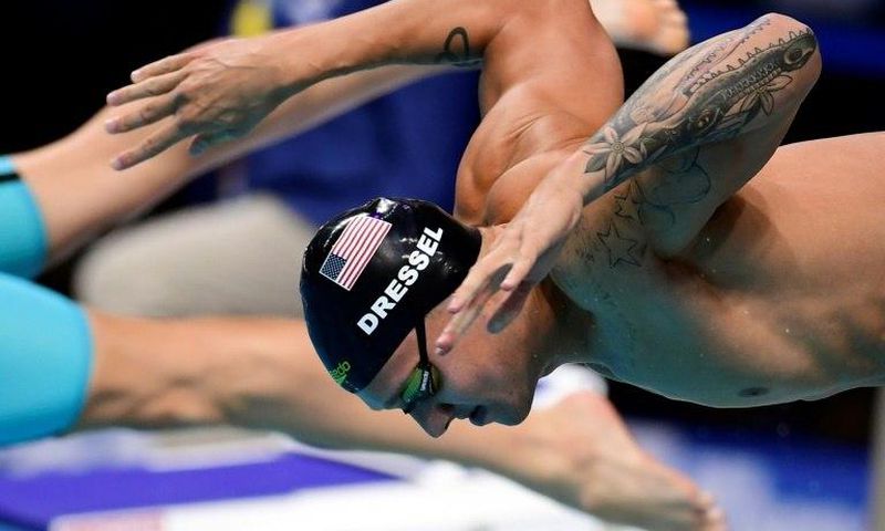 American Caeleb Remel Dressel competes in the mixed 4x100m freestyle final on July 29, 2017