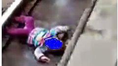 1-year-old girl survives unhurt after train passed over her