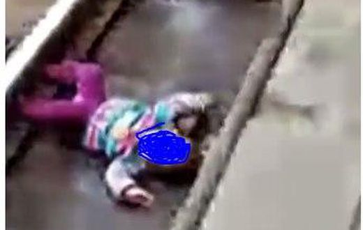 1-year-old girl survives unhurt after train passed over her