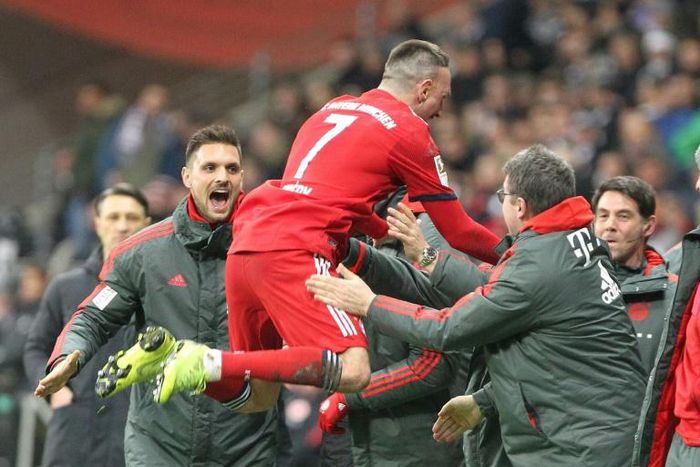 French midfielder Franck Ribery celebrates with the Bayern Munich bench