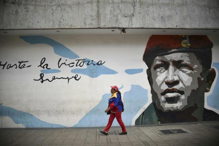 A mural of Hugo Chavez, the patron saint of Venezuela's socialists, who became president in 1999 and died of cancer in 2013 while in office