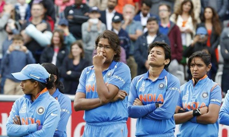 India's women's team wait to collect their runners-up medals after defeat to England in the World Cup final at Lord's on July 23, 2017