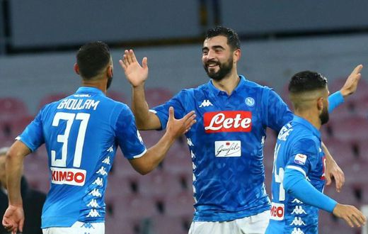 Napoli's Spanish defender Raul Albiol (c) celebrates his first goal this season.