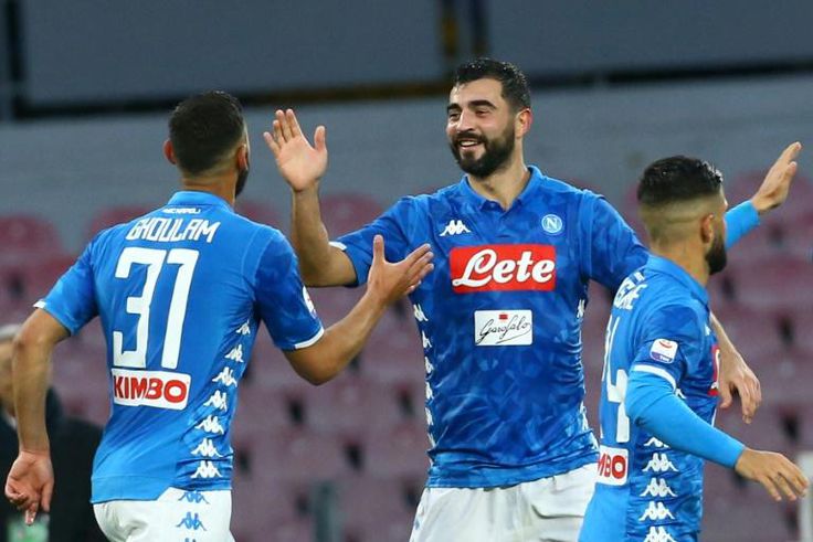 Napoli's Spanish defender Raul Albiol (c) celebrates his first goal this season.