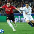 Phil Jones scored an embarassing own goal but Manchester United qualify for Champions League last 16