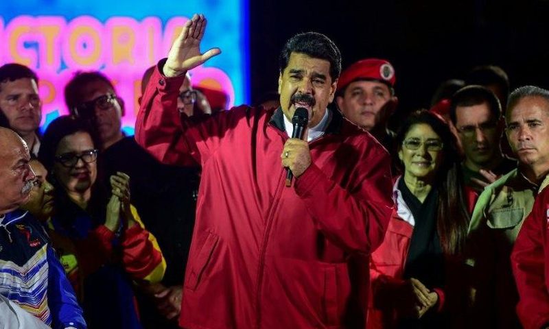 Venezuelan President Nicolas Maduro, shown in this July 31 file photo, says he's willing to travel "by motorbike or mule" to make his plane available to his country's athletes