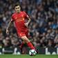 Liverpool's midfielder Philippe Coutinho runs with the ball during the English Premier League football match against Manchester City March 19, 2017