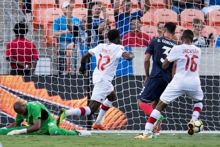Canada's midfielder Alphonso Davies (2L) celebrates after scoring a goal during a Group A match against Costa Rica in the 2017 CONCACAF Gold Cup on July 11, 2017 at the BBVA Compass Stadium in Houston, Texas