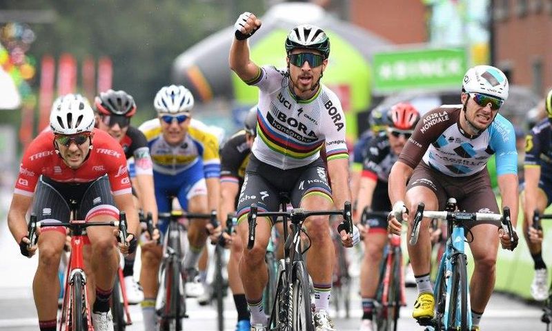 Slovakia's Peter Sagan of Bora-Hansgrohe (C) celebrates as he crosses the finish line to win at the end of the third stage of the BinckBank Tour 2017, 185 km from Blankenberge to Ardooie in Belgium, on August 9, 2017