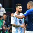 Kylian Mbappe consoles Lionel Messi after France's 4-3 win over Argentina in the last 16 of the World Cup