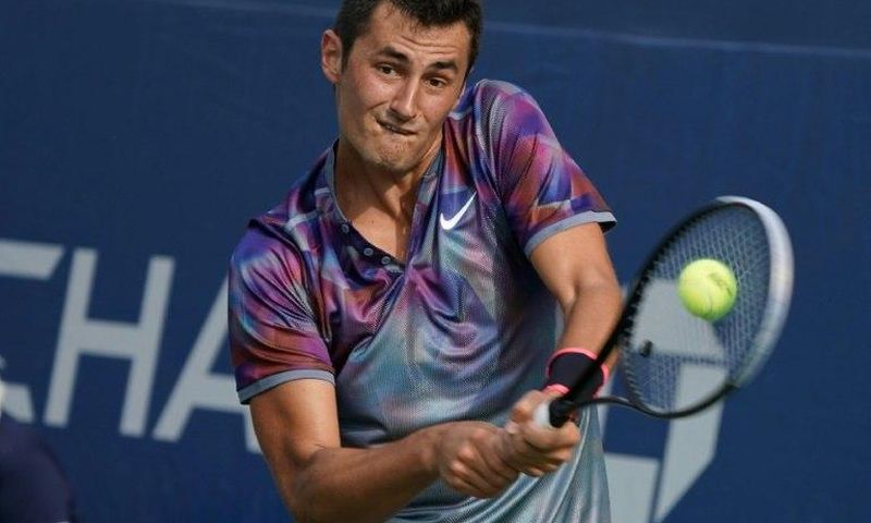 Australia's Bernard Tomic returns the ball to Luxemburg's Gilles Muller on August 28, 2017