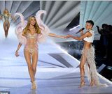 Plus-size women strip to their bikini to protest against Victoria's Secret