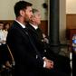 Barcelona's football star Lionel Messi (L) and his father Jorge Horacio Messi face judges in a tax fraud case in court in Barcelona in June 2016