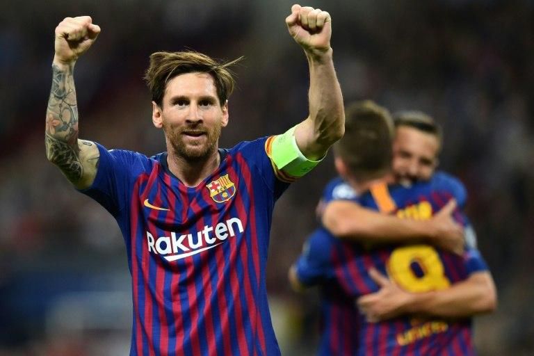 Lionel Messi celebrates scoring against Tottenham at Wembley