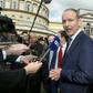 Fianna Fail leader Micheal Martin (C, pictured March 2016) said that his party is "determined that the political chaos we see in London will not be allowed to spread to Ireland"
