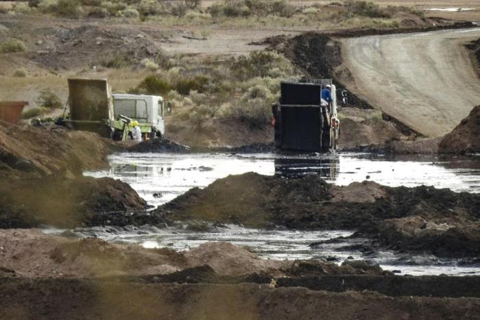 This handout photo distributed by Greenpeace on December 17, 2018 shows an illegal waste dump, where toxic fracking waste chemicals are poured in Vaca Muerta, Neuquen province, Argentina