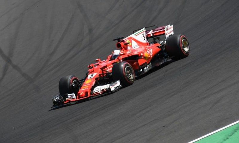 Ferrari's German driver Sebastian Vettel races at the Hungaroring circuit in Budapest on July 30, 2017, during the Formula One Hungarian Grand Prix