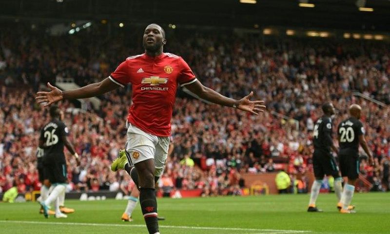 Manchester United's striker Romelu Lukaku celebrates scoring his team's second goal during the English Premier League football match against West Ham United August 13, 2017