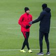 Neymar talks with Paris Saint-Germain coach Thomas Tuchel at training on Tuesday