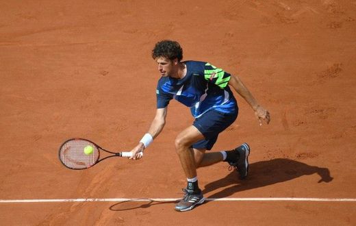 Netherlands' Robin Haase returns the ball to Spain's Rafael Nadal during their tennis match at the Roland Garros 2017 French Open on May 31, 2017 in Paris.