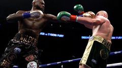 Wilder retains WBC heavyweight title by split draw with Fury