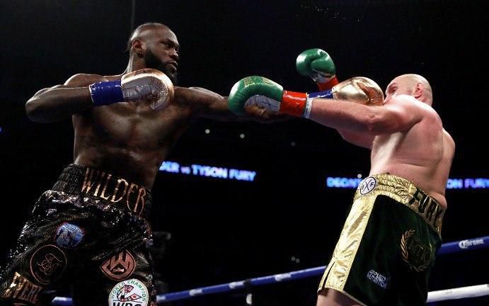Wilder retains WBC heavyweight title by split draw with Fury