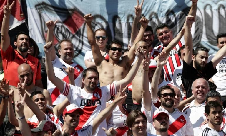 Supporters of River Plate cheering ahead of the second leg of the all-Argentine Copa Libertadores final against Boca Juniors
