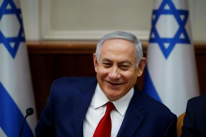 Israeli Prime Minister Benjamin Netanyahu attends the weekly cabinet meeting at the Prime Minister's office in Jerusalem on December 23, 2018