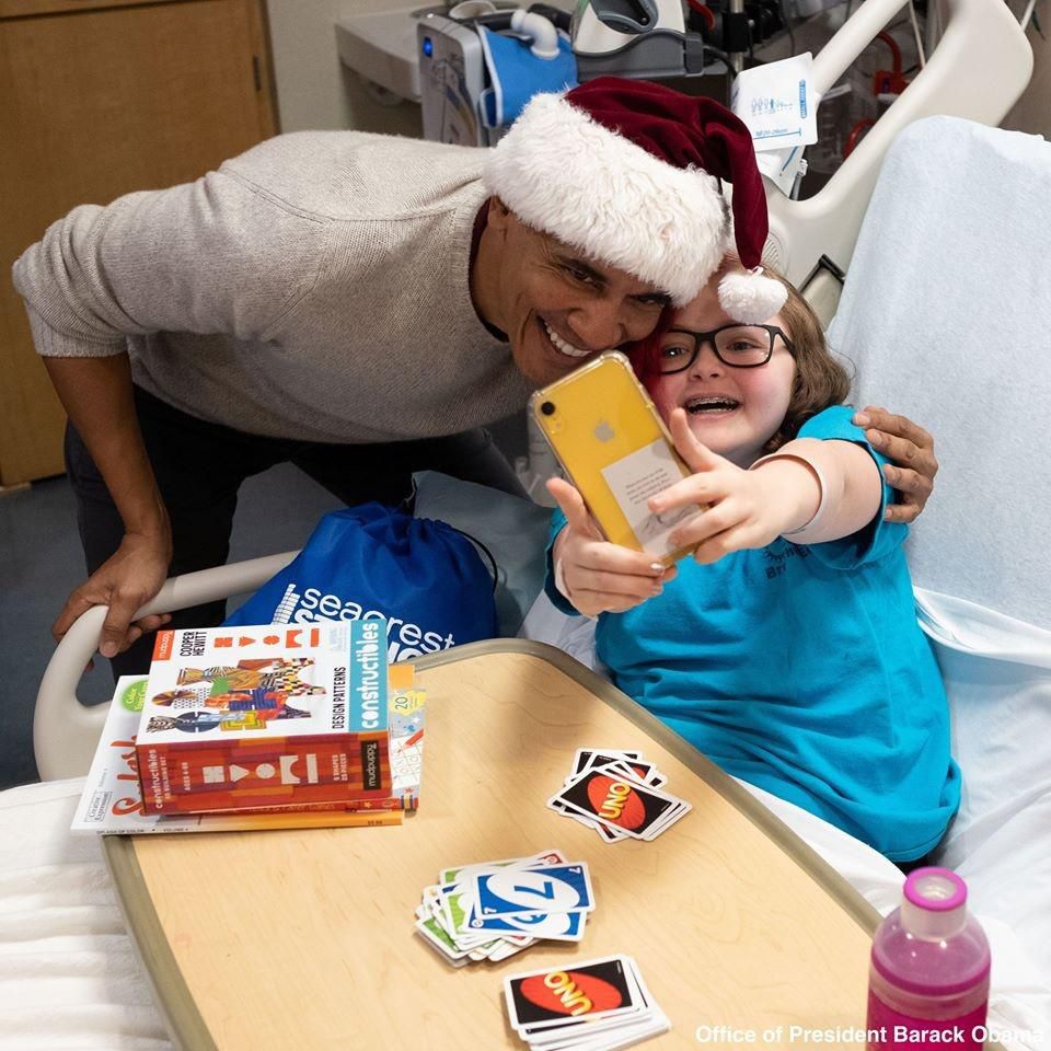 Former US President, Barack Obama pays surprise visit to hospital with Christmas gifts