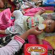 Aid workers have reported children are sick with fevers following the tsunami in Indonesia