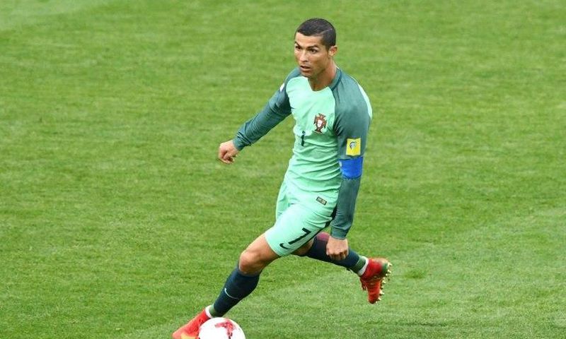 Portugal's forward Cristiano Ronaldo controls the ball during the 2017 Confederations Cup group A football match against Russia June 21, 2017