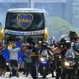 The Boca Juniors team bus had a heavy police escort but had to negotiate throngs of River Plate fans before reaching the stadium