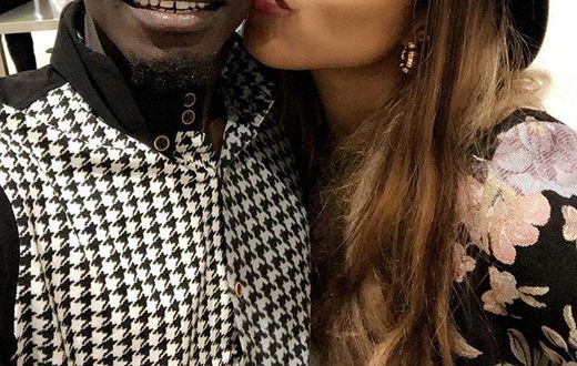 Photo: Joselyn Dumas kisses Lil Win