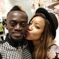 Photo: Joselyn Dumas kisses Lil Win